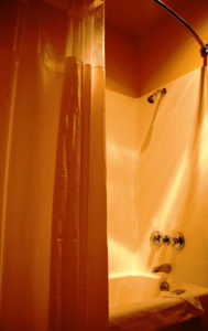 guest bathroom shower at Riata Inn Crystal City