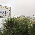 road sign for Riata Inn Crystal City