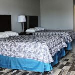 guest room with two queen beds