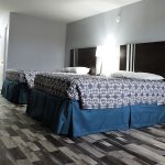 guest room with two queen beds