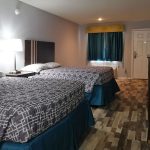 guest room with two queen beds