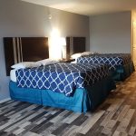guest room with two queen beds
